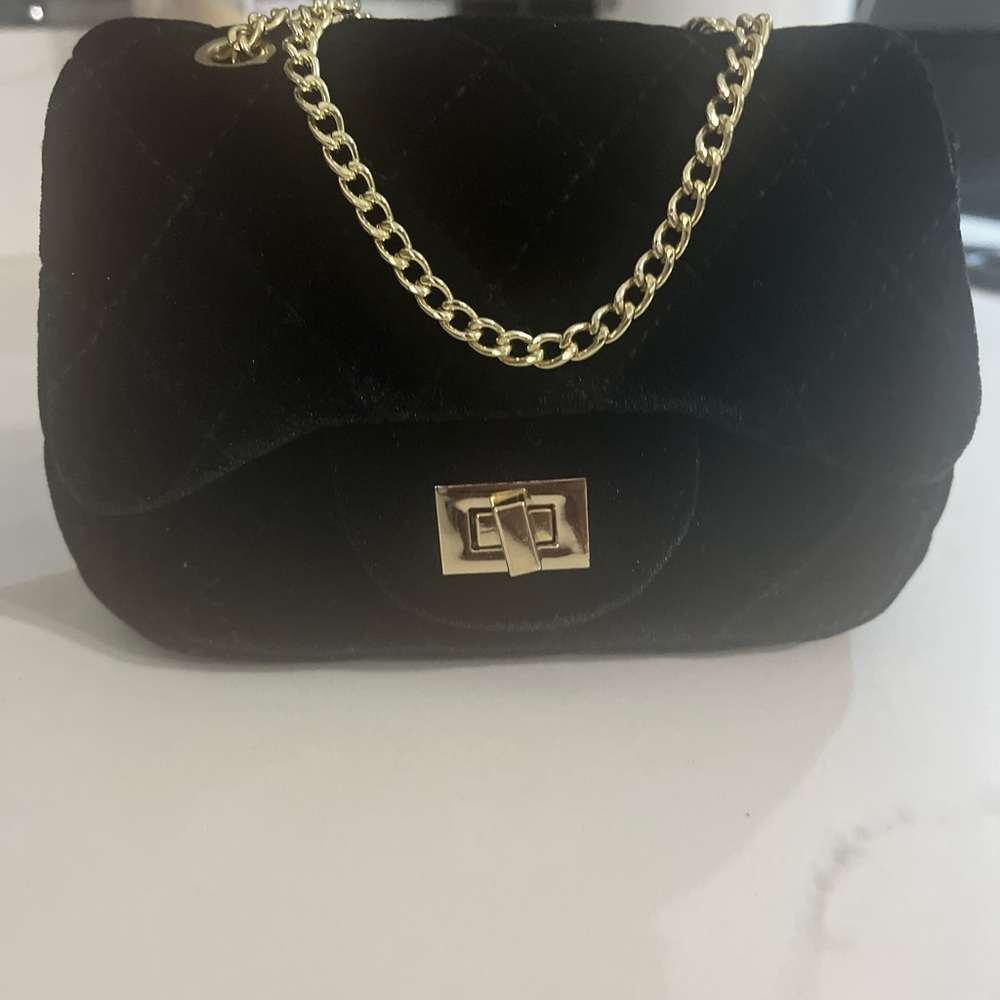 Black and gold suede purse